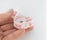 Woman hold soft body measuring tape with centimeters and inches. Taylor measure tape for sewing on white
