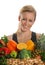 Woman holdind a basket of fruits