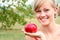 Woman holding apple