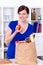 Woman holding an apple and shopping bag