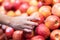 woman holding apple to choose fresh apple best fruit for good health