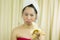 Woman holding banana acting smile, sad, funny, wear a skirt to cover her breast after wash hair, Wrapped in Towels After Shower