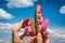 Woman is holding barefoot shoes with flexible sole