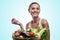 Woman holding basket with vegetable. Concept vegetarian dieting