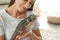 Woman holding bearded lizard, closeup. Exotic pet