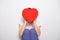 Woman holding a big red box in shape of a heart. Trendy video banner for Valentines Day, International Womens Day or