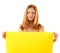 Woman holding blank yellow banner