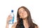 Woman holding a bottle of water in her hand