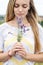 Woman holding a bouquet of lavender, close-up