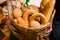 Woman holding bread in basket,Composition with variety of baking