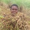 Woman holding bunch of peanuts