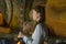 Woman holding burning sticks of incense at the ancient buddhist temple