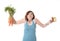 Woman holding carrots and cake healthy nutrition