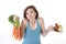 Woman holding carrots and cake healthy nutrition