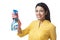 Woman holding cleaning fluid