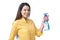 Woman holding cleaning spray bottle