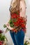 Woman holding crocosmia montbretia flowers