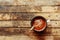 Woman holding cup of hot chocolate. Hot Chocolate in wooden tabl