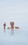 Woman Holding Daiquiri In Infinity Pool