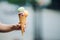 Woman holding delicious colorful ice cream.Summertime vibes and sweet food.