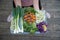 Woman holding delicious vegan plate full of vegetables