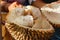 Woman holding divided in the half Durian fruit