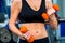 Woman holding dumbbell workout at gym.