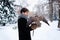 Woman holding a falcon