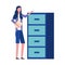 Woman holding folder office cabinet drawers