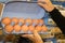 Woman holding Free Range Eggs at supermarket