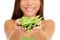 Woman holding fresh green snow peas in hands