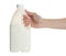 Woman holding gallon bottle of milk on white background, closeup