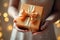 Woman Holding Gift Box Concept for Anniversary Surprise, Female Gifting Gesture, and Luxury Wrapped Presents
