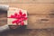 Woman holding gifts for special moments with special who on wood