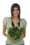 Woman holding an green endive salad