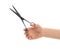 Woman holding hairdresser`s scissors, closeup