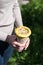 Woman holding healthy vegan street food in her hands