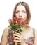 Woman holding Hypericum flowers