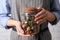 Woman holding jar with aromatic potpourri, closeup