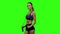 Woman holding jump rope on her shoulders. Slow motion. Green screen