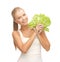 Woman holding lettuce