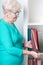 Woman holding photo album