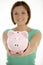 Woman Holding Piggy Bank