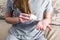 Woman holding pill and glass of water in hands taking emergency medicine, supplements painkiller medication.