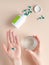 A woman is holding pills in her hands. Empty white bottle for packaging medicines. Mockup.