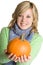 Woman Holding Pumpkin