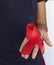 Woman holding a red ribbon December 1 of every year People around the world hold World AIDS Day to remember those who have died