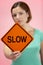 Woman Holding Road Traffic Sign