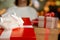 Woman holding several gifts for Christmas. Close up view of a re
