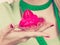 Woman holding strawberry sweet cupcake